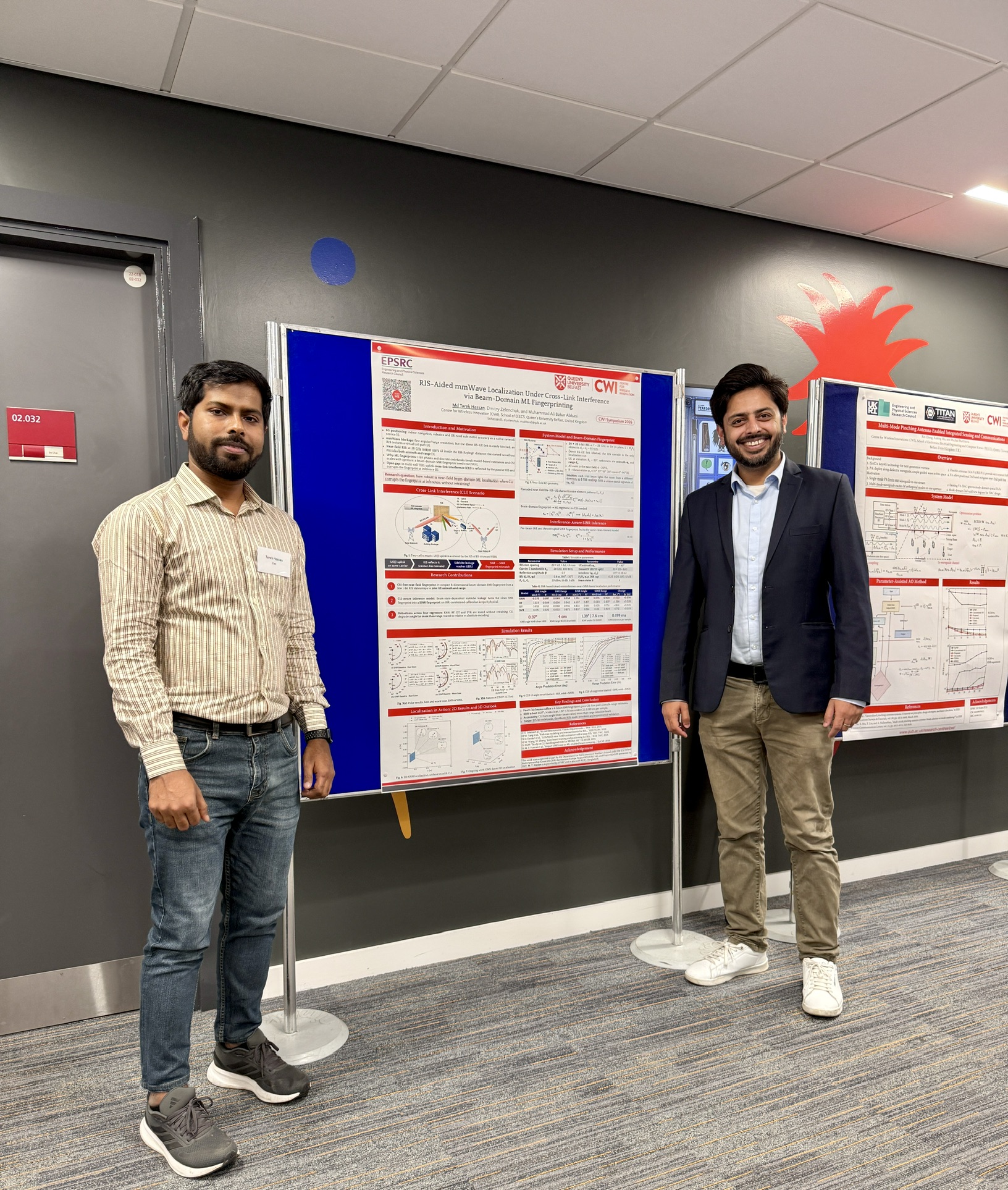 Md Tarek Hassan with his second PhD supervisor beside the research poster