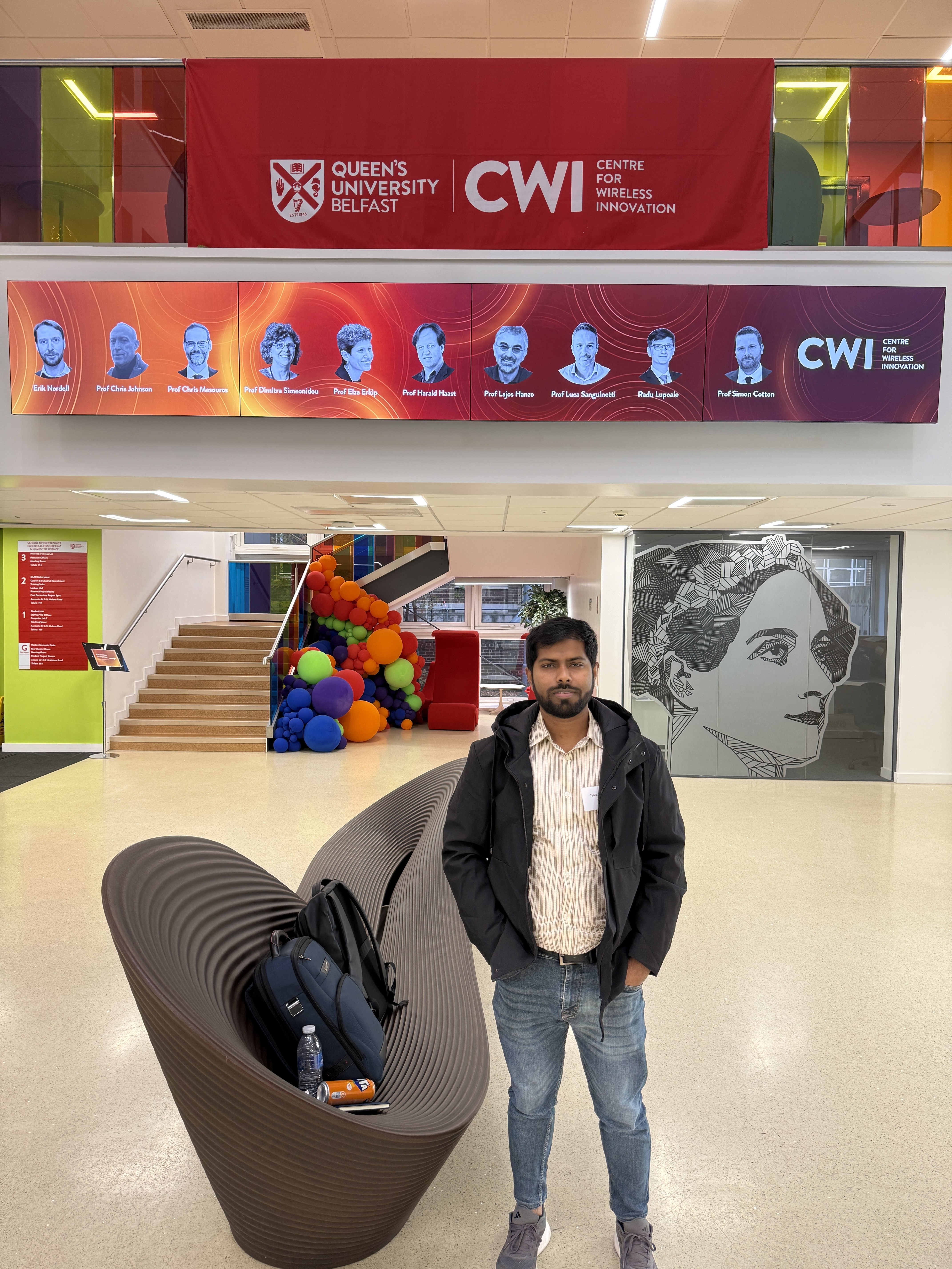 Md Tarek Hassan beneath the CWI Symposium 2026 speaker display