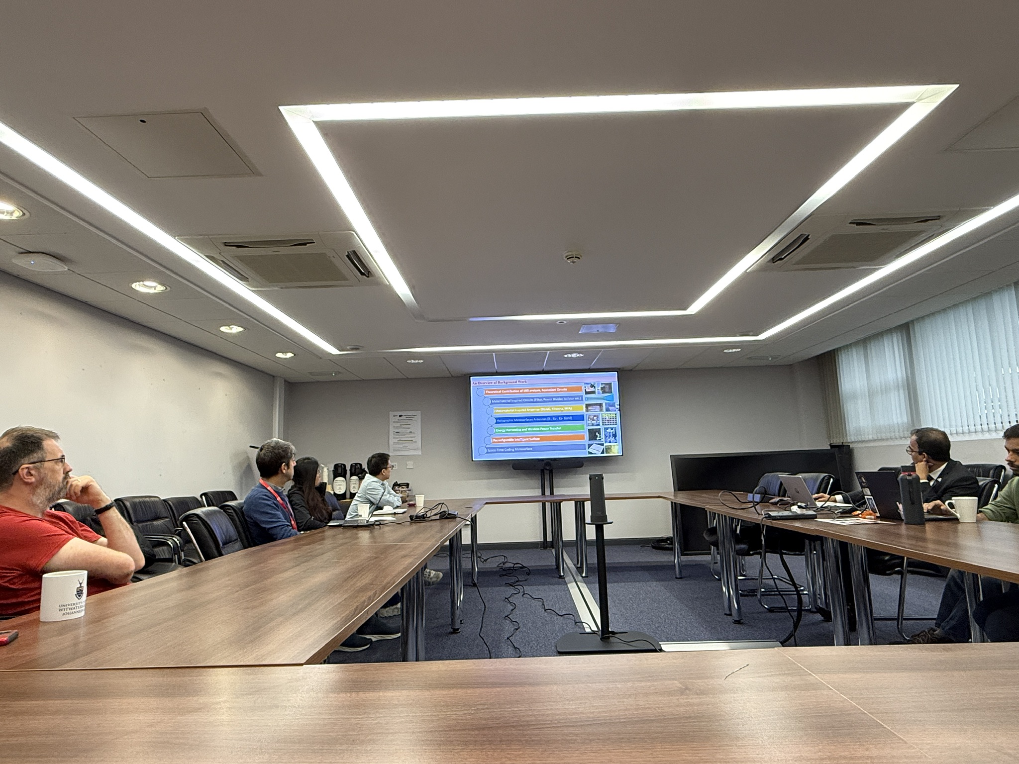 Attendees watching the invited talk in the NITC Seminar Room